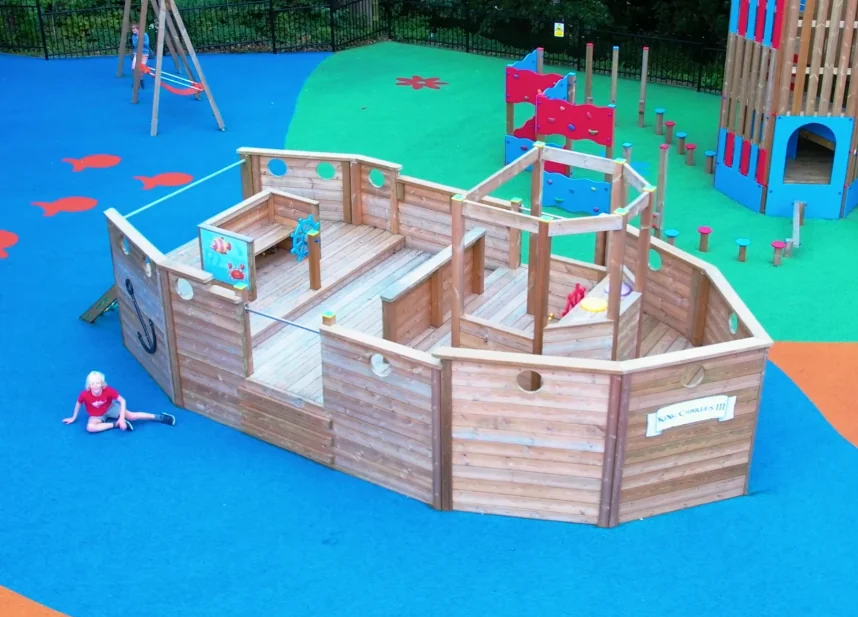 Padstow Trawler wooden playground boat viewed from the left side in a school play area