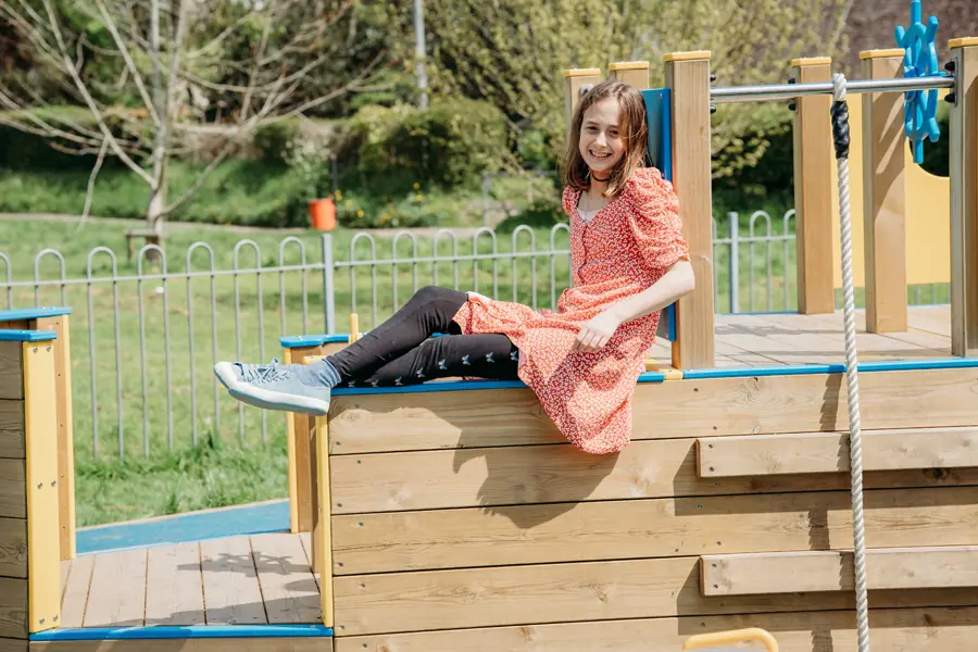 St Eval Sailor wooden playground boat with climbing steps and ship wheel