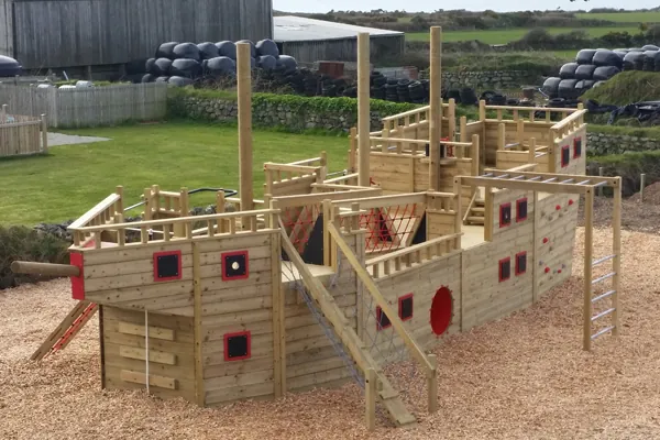 Side view of Trevalgan Galleon timber playground ship with access ladder