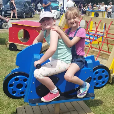 Children play vehicle rocker outdoor
