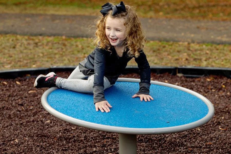 Round playground spinner outdoor play equipment