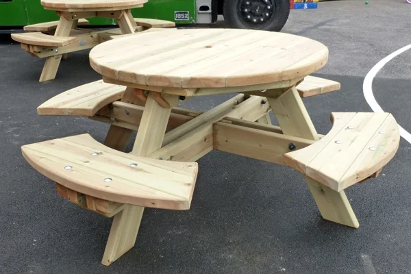 Round wooden picnic table outdoor seating