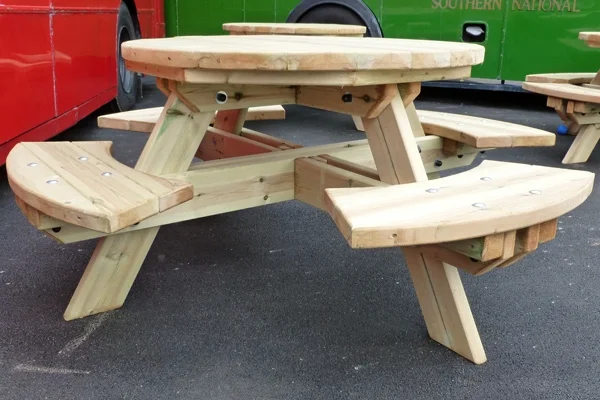 Round wooden picnic table outdoor seating