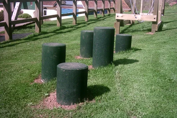 Timber rubber stepping logs balance play equipment in a school playground