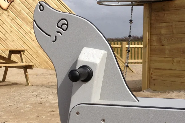 Seal themed playground seesaw spring
