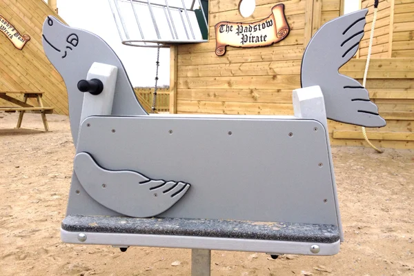 Seal themed playground seesaw spring