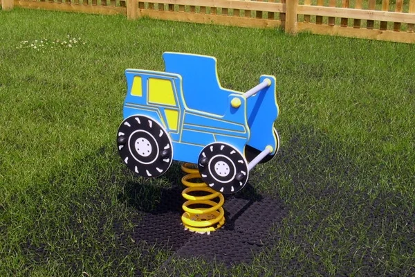 Timber wooden tractor play equipment for children in outdoor playground
