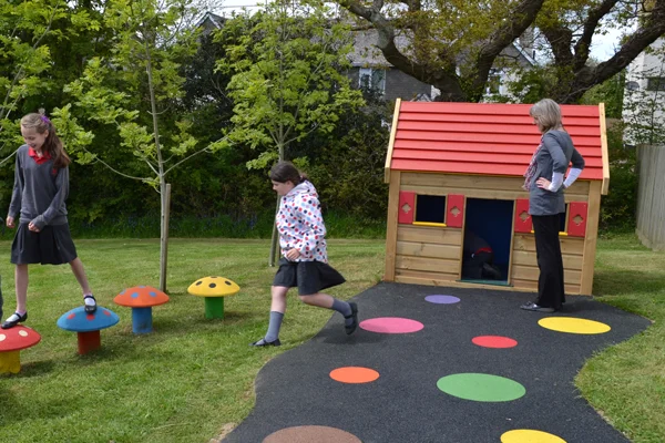 Wooden cottage playhouse outdoor play